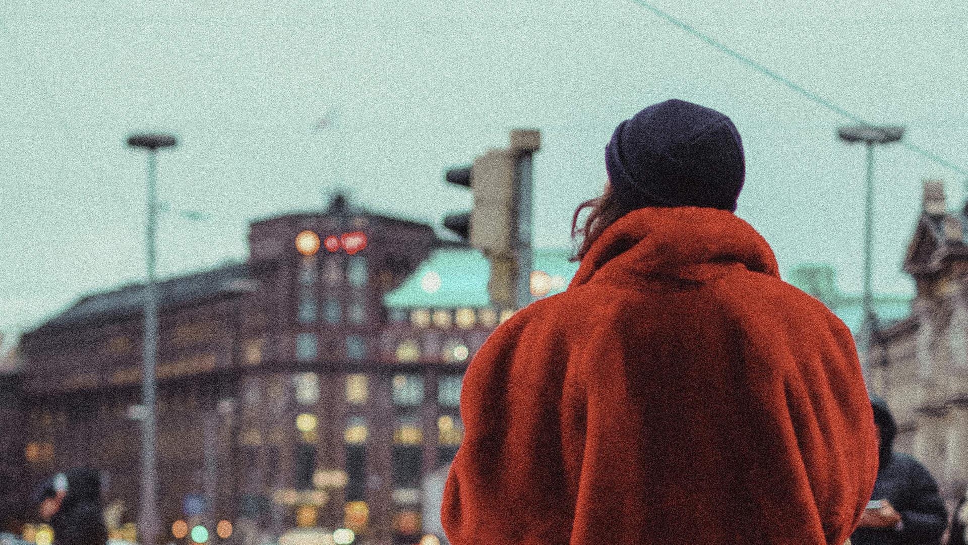 Woman looking at a building prono